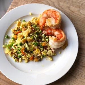 plated cauliflower fried rice with freshly cooked prawns
