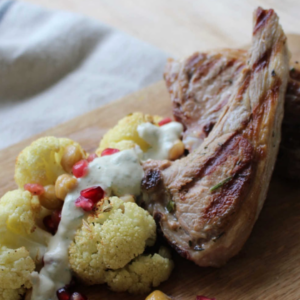 Lamb Cutlets with Roasted Cauliflower and Green Tahini Dressing from Nutritionist Laura Bond